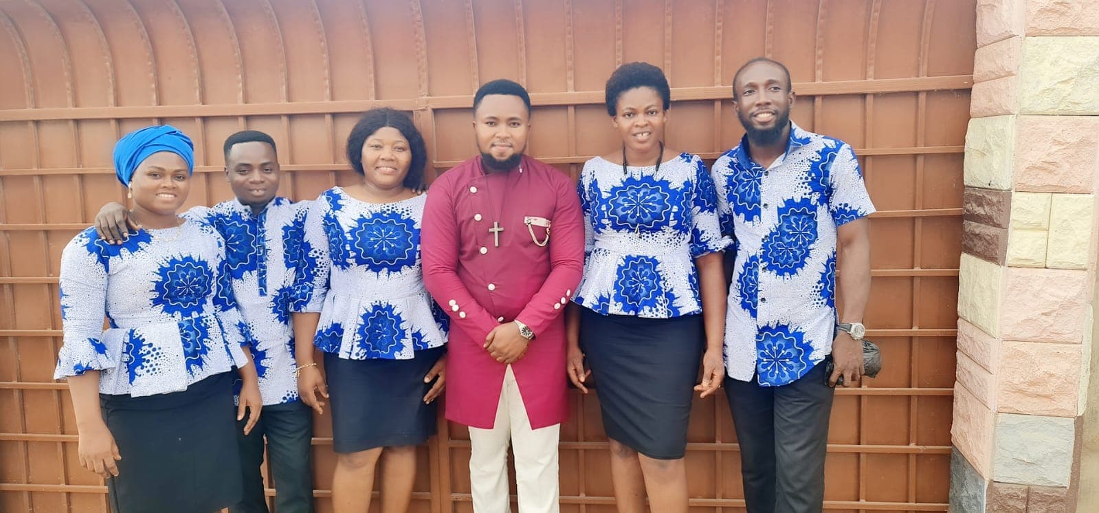 Group portrait of DAG Foundation team members with Prophet William Osei.
